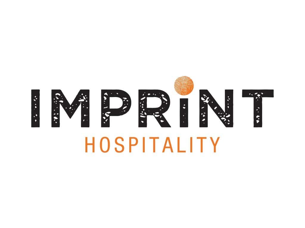 Imprint Hospitality logo with a textured black wordmark and an orange fingerprint dot